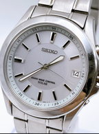 Seiko 7B22-0AY0 Men's Solar Watch — Stainless Steel, White Dial